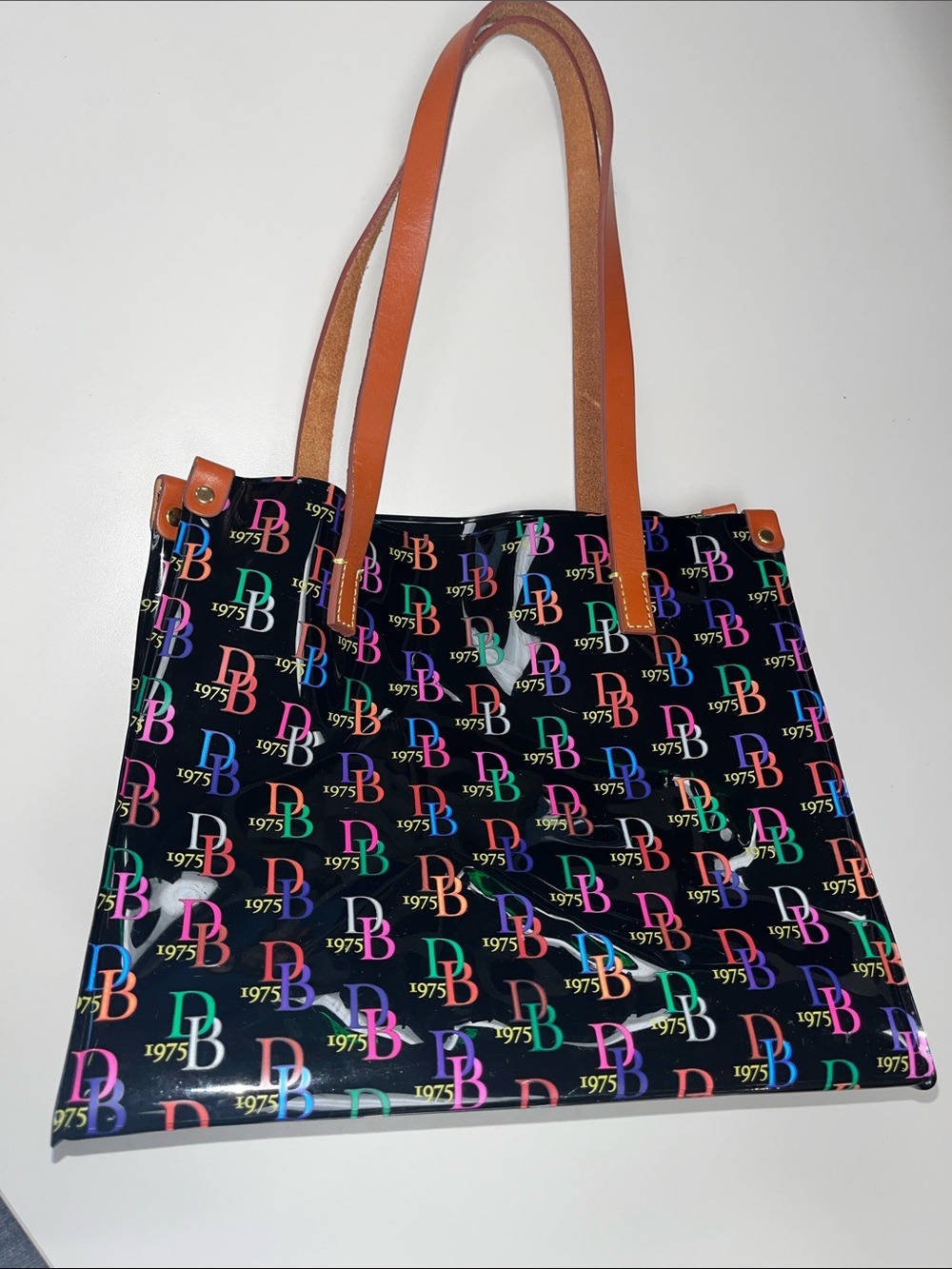 Dooney & Bourke Black Patent Tote with Multicolor DB Logo and Tan Straps